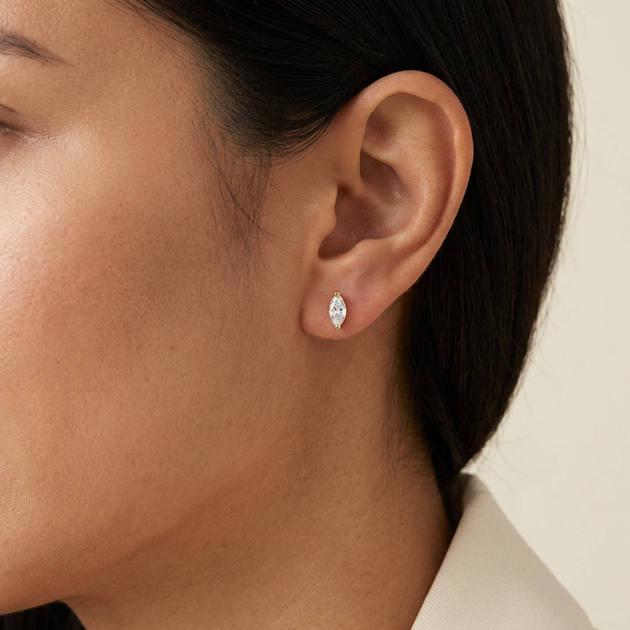 Petal studs worn on an ear